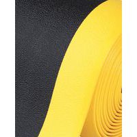 superficie granulada, color negro/amarillo